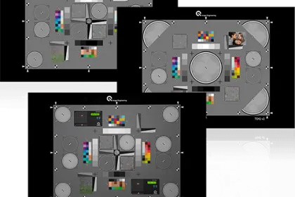 Three angled image quality blog test charts with various patterns and color swatches on a black background