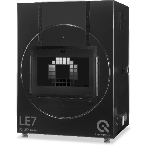 Black rectangular device with a square screen displaying a gray scale chart, text "LE7" and "Image Engineering" logos