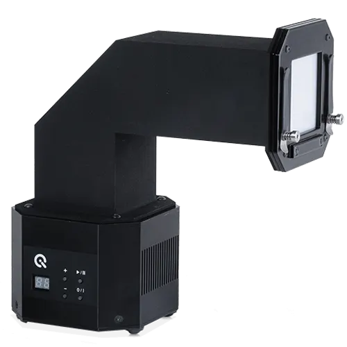Black, L-shaped industrial machine with a digital display and control buttons, likely for production line integration