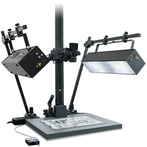 Two black narrow band light sources, one angled and one flat, illuminate a white grid on a gray base