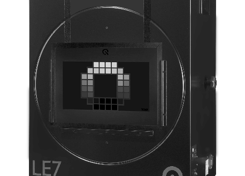 Black rectangular device with a square screen displaying a gray scale chart, text "LE7" and "Image Engineering" logos